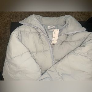 Urban Outfitters puffer jacket in size XS. Light blue.